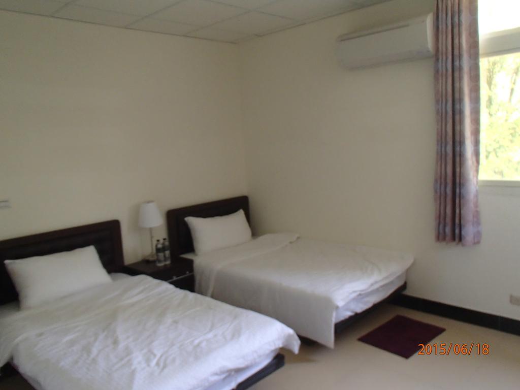 成功民宿 Km Bed And Breakfast Csinhu Szoba fotó